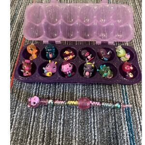 12 Hatchimals with container and a Twisty Pet Lama Bracelet